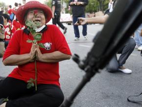 The Thai military battered its way into the Red Shirt encampment in central Bangkok