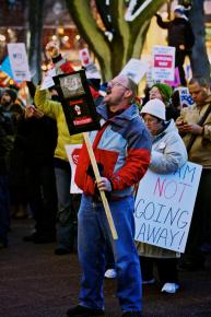 Crowds of people gathered in furious protest as lawmakers rammed through Scott Walker's union-busting assault