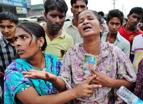 Family members mourn loved ones lost in the factory collapse in Bangladesh