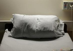 An empty hospital bed